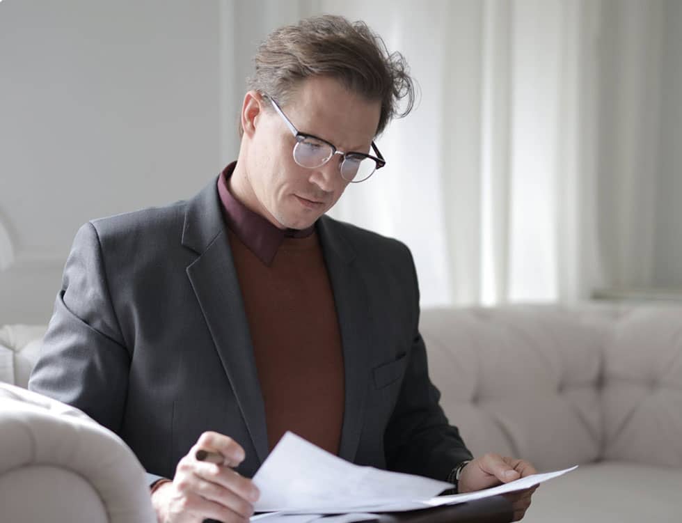 Man Reading Papers Man Reading Papers